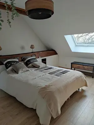 Un ou plusieurs lits dans un hébergement de l'établissement Gîte des Toucanes