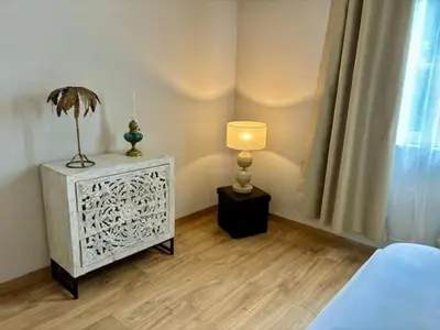 Un ou plusieurs lits dans un hébergement de l'établissement Le Dolby - 2 appartements communiquants avec parking privé 4 couchages