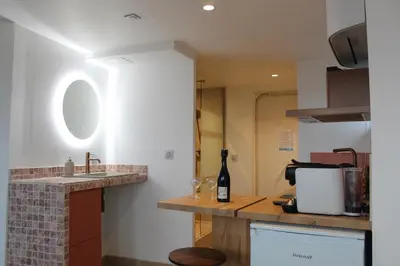 Cuisine ou kitchenette dans l'établissement La Tour'angelle