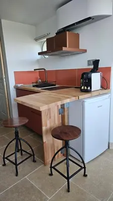 Cuisine ou kitchenette dans l'établissement La Tour'angelle