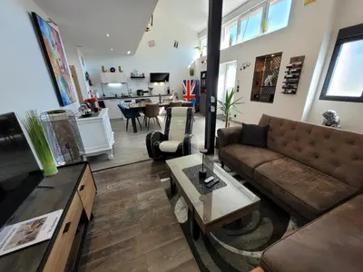 Cuisine ou kitchenette dans l'établissement Indus'Loft and Spa-Jacuzzi et Parking Privé
