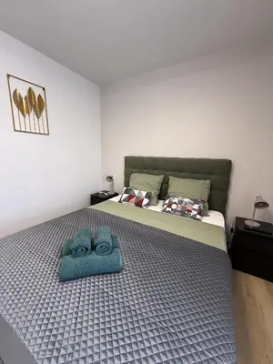 Un ou plusieurs lits dans un hébergement de l'établissement Vinci Vibes - Maison cool pour des voyageurs cool