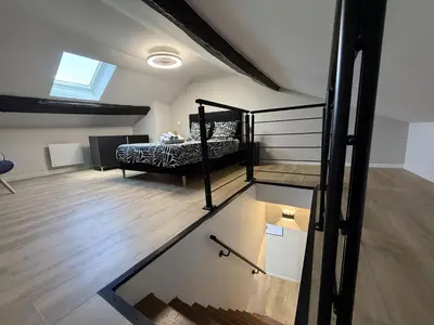 Un ou plusieurs lits dans un hébergement de l'établissement Vinci Vibes - Maison cool pour des voyageurs cool