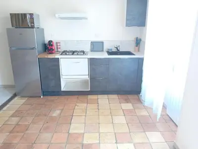 Cuisine ou kitchenette dans l'établissement la sterne