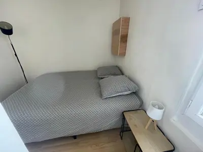 Un ou plusieurs lits dans un hébergement de l'établissement Le Nid du Rempart Charmant Appt 2p TOURS centre