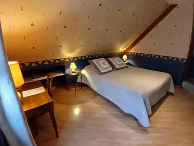 Un ou plusieurs lits dans un hébergement de l'établissement Chambres d'hôtes La Cabriole - Entre Amboise & Chenonceau