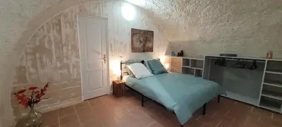 Un ou plusieurs lits dans un hébergement de l'établissement Ancien Moulin au fil de l'Indrois Semi-troglodyte -Zoo de Beauval