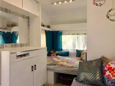 Un ou plusieurs lits dans un hébergement de l'établissement Glamping du loup garou
