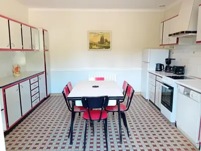 Cuisine ou kitchenette dans l'établissement La maison du Vigneron