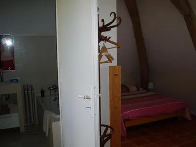 Un ou plusieurs lits dans un hébergement de l'établissement Le Manoir des Prés