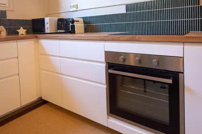 Cuisine ou kitchenette dans l'établissement Les Gens Heureux - Tours centre
