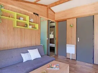 Coin salon dans l'établissement Chalet 35m² avec Terrasse pour 7 personnes - API-1-52-515