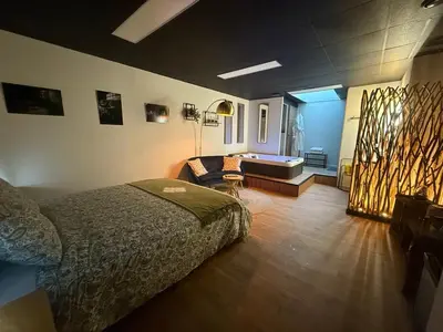 Un ou plusieurs lits dans un hébergement de l'établissement Les lofts du Château de Posset