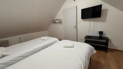 Un ou plusieurs lits dans un hébergement de l'établissement Duplex pour groupe au centre d'Azay Le Rideau