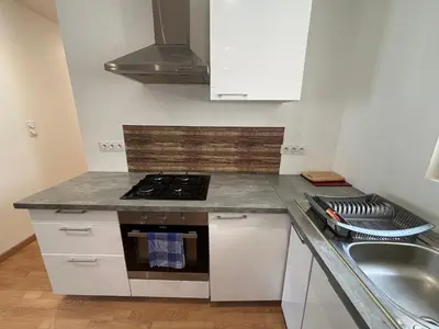 Cuisine ou kitchenette dans l'établissement Duplex pour groupe au centre d'Azay Le Rideau