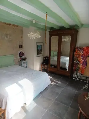 Un ou plusieurs lits dans un hébergement de l'établissement maison belle au bois dormant