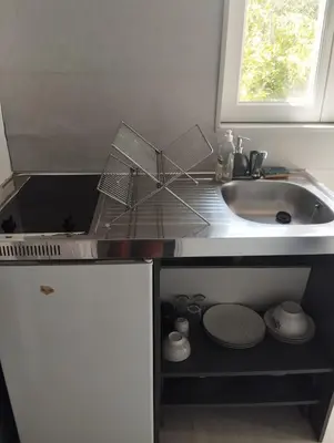 Cuisine ou kitchenette dans l'établissement F1 meublé indépendant