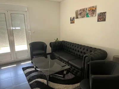 Coin salon dans l'établissement Appartement sympathique