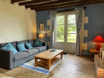 Coin salon dans l'établissement La Maison de Maître, Loire Gîte