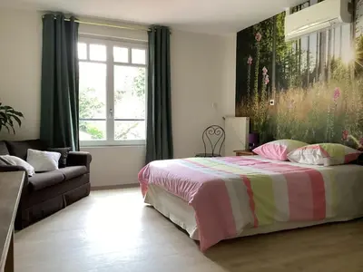 Un ou plusieurs lits dans un hébergement de l'établissement Le Patchouli