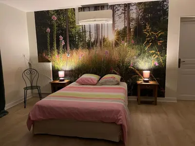 Un ou plusieurs lits dans un hébergement de l'établissement Le Patchouli