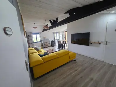 Télévision ou salle de divertissement dans l'établissement Appartement de Charme