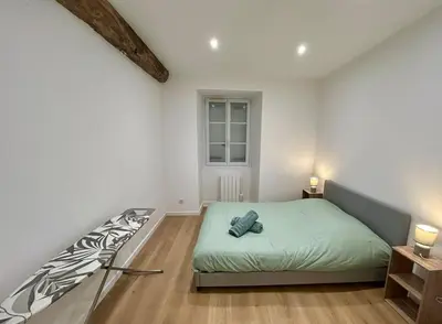 Un ou plusieurs lits dans un hébergement de l'établissement Quiet apartment - Touraine