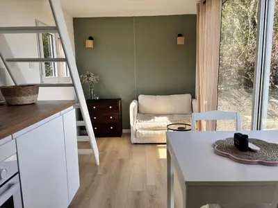 Cuisine ou kitchenette dans l'établissement Tiny House cosy