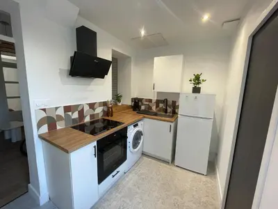 Cuisine ou kitchenette dans l'établissement Chez Elo