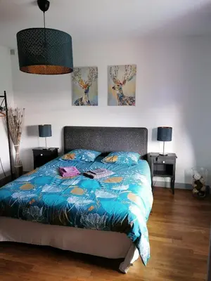 Un ou plusieurs lits dans un hébergement de l'établissement Gite Les petits balcons