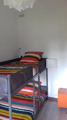 Un ou plusieurs lits dans un hébergement de l'établissement Gite Les petits balcons