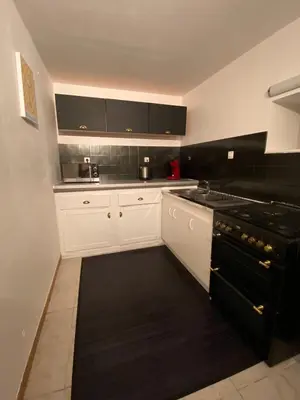 Cuisine ou kitchenette dans l'établissement L'Oret'Home