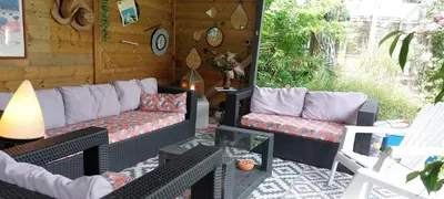Coin salon dans l'établissement Appt dans maison d'architecte, Spa, Piscine & jardin