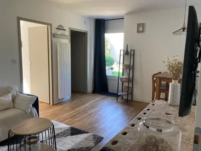 Télévision ou salle de divertissement dans l'établissement Maison de ville