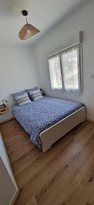 Un ou plusieurs lits dans un hébergement de l'établissement Cottage La Rive du Loir 2km from Zoo de la Flèche
