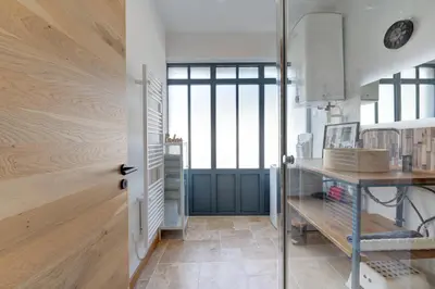 Cuisine ou kitchenette dans l'établissement L'Atelier du Château