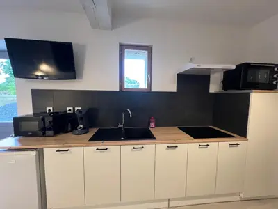 Cuisine ou kitchenette dans l'établissement Gîte Les 4 Terres - Maison 1 chambre