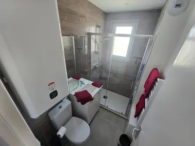Salle de bains dans l'établissement Location au pied du circuit