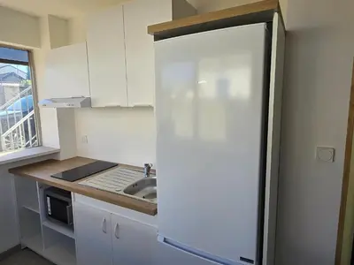 Cuisine ou kitchenette dans l'établissement Location au pied du circuit