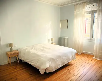 Un ou plusieurs lits dans un hébergement de l'établissement Maison de charme Hyper centre