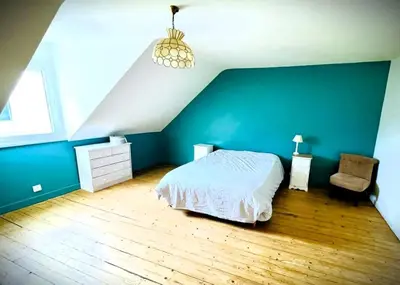 Un ou plusieurs lits dans un hébergement de l'établissement Maison de charme Hyper centre