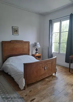 Un ou plusieurs lits dans un hébergement de l'établissement House Le Havre du Négociant