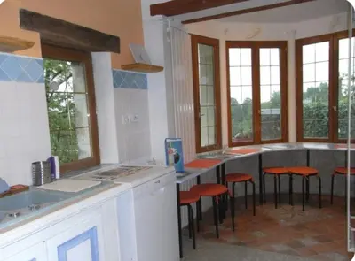 Cuisine ou kitchenette dans l'établissement Gîte Madrelle