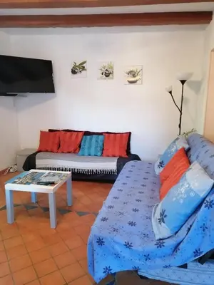 Coin salon dans l'établissement Gîte Madrelle