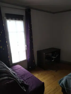 Un ou plusieurs lits dans un hébergement de l'établissement Chambre chez l'habitant
