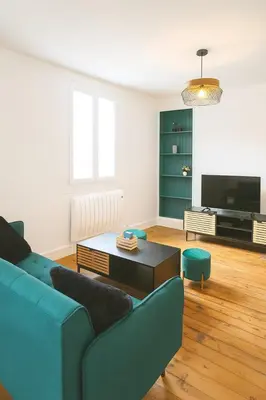 Coin salon dans l'établissement Le Nid Citadin
