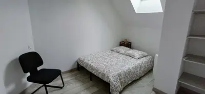 Un ou plusieurs lits dans un hébergement de l'établissement L'Escapade Courteline