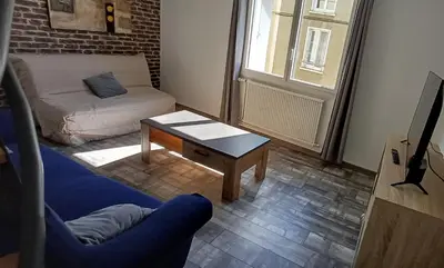 Coin salon dans l'établissement L'Escapade Courteline