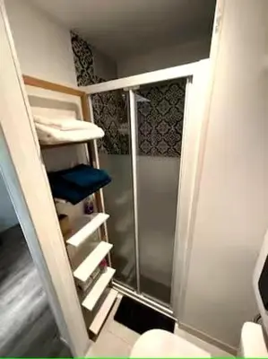 Un ou plusieurs lits superposés dans un hébergement de l'établissement le Nook - Studio cosy au Mans