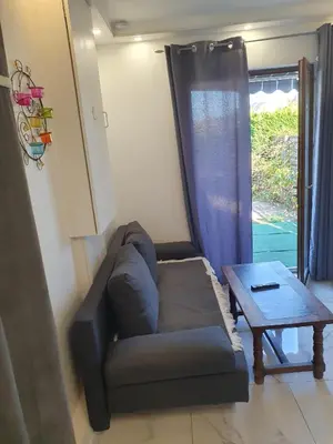 Coin salon dans l'établissement MAISON spacieuse